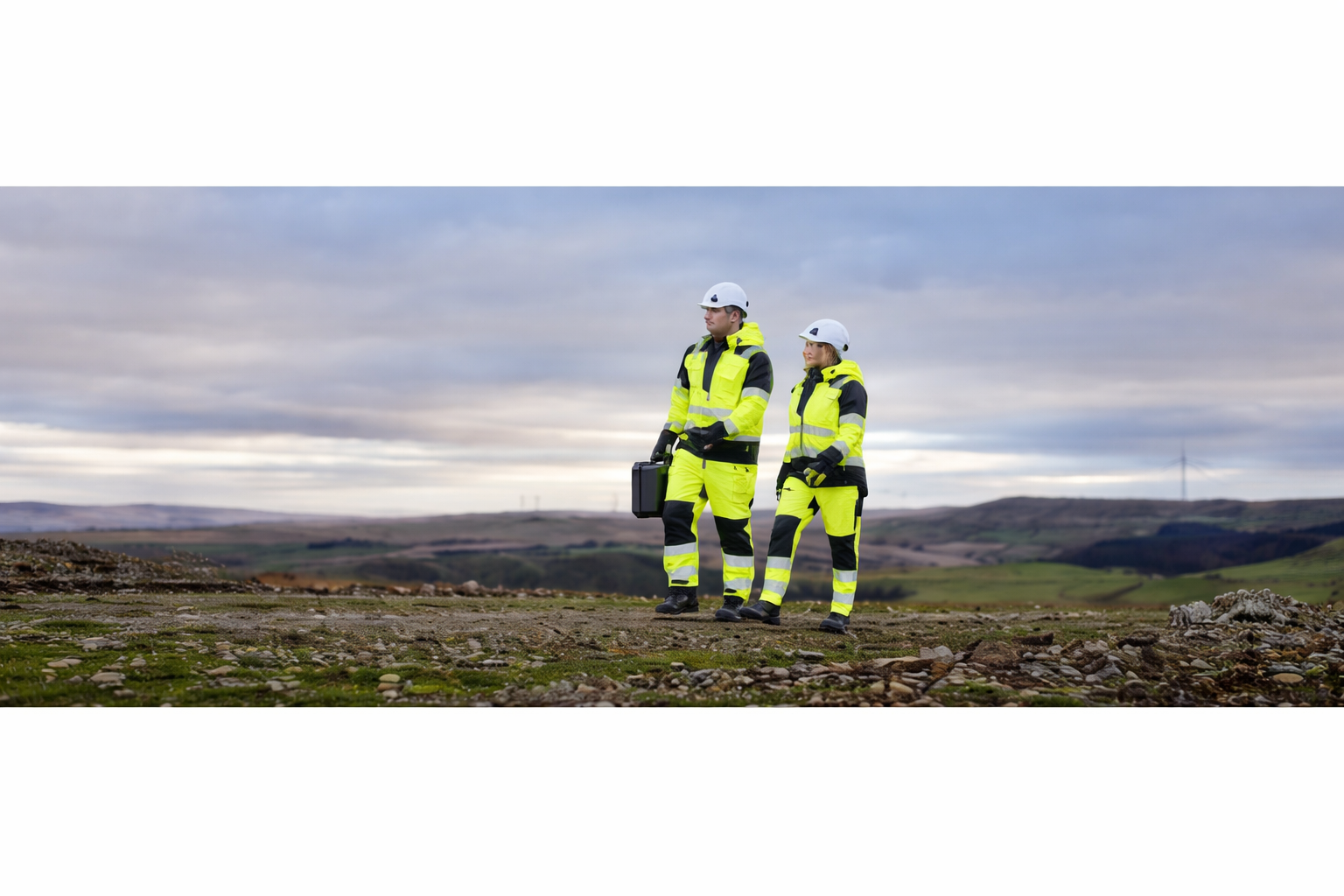 Hi vis workwear worn by workers on site, including high visibility jackets and trousers